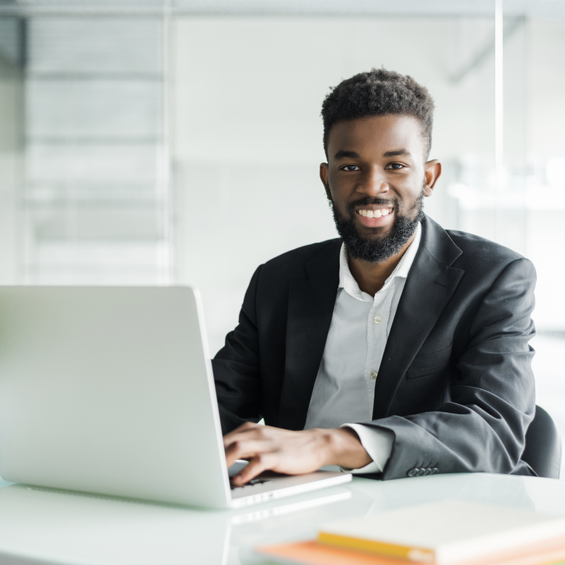 https://paltonmorgan.com/naresus/2020/10/portrait-of-handsome-african-black-young-business-man-working-on-laptop-at-office-desk2.png